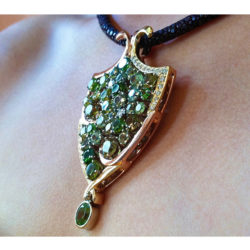 Cynthia Renee Full Custom “ Impressionist” Pendant in 14 karat rose gold, 18 karat yellow gold and palladium featuring a collection of Demantoid Garnets from different localities.
