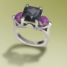 "Blackberry Winter" ring in palladium features a Graphite-colored Spinel from Burma accented by a pair of Pink Sapphires.