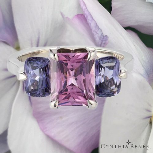 "Oslo” 3-stone ring in palladium featuring 1.90 carats. Rose Spinel accented by 1.85 carats pair of Blue Spinel.