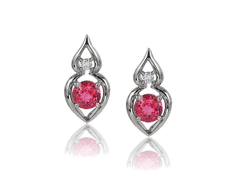 “Pantea” earrings in palladium featuring 2.67 ct. pair of electric Red Spinel accented by 0.15 cts. fine round diamonds; post with friction back. Tail on back supports drop.
