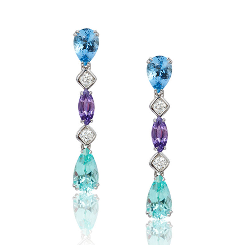 "Gem Garland" drop earrings in 18 karat white gold featuring 1.76 carats Aquamarine; 2.58 carats of rare Cuprian (Paraiba) Green Tourmaline; 1.10 carats Purple Sapphire accented by 0.35 carats of fine, white diamonds.