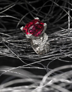"Ring Pop" ~ Cynthia Renee Bespoke Ring featuring 16.25 carat Red Spinel (Tanzania) accented by 1.83 carats of diamond baguettes (E/F-VS+) and 1.54 carats of diamond rounds (E/F-VS+). The diamond baguettes extend completely around the ring and beneath the X’s; setting alone took forty hours.