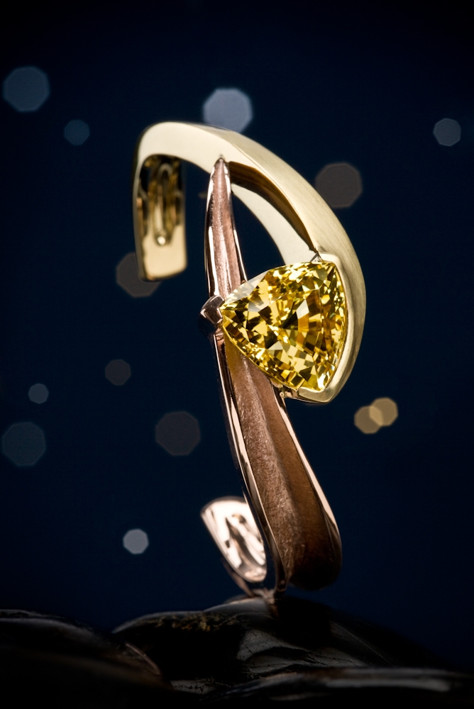 Cynthia Renee custom design cuff bracelet featuring a seventeen carat, unheated Yellow Sapphire (Sri Lanka) and set in 18-karat yellow gold and 14-karat rose gold.