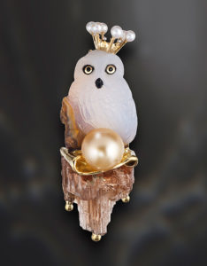 "Petite Owl Queen" ~ Cynthia Renee bespoke brooch in 18 kt yg with platinum granulation (crown)  featuring Hans-Ulrich Pauly hand-carved Barn Owl in Oregon Opal (N) perched on a 16.88 ct. natural bronze tourmaline crystal with a 9 mm natural yellow South Sea Pearl and six 2.5 mm white, round pearls.  Inspired by a line of poetry, "…standing at the edge of the mystery..." from "Owls" in Owls and Other Fantasies, Poems and Essays," by Mary Oliver, 2003