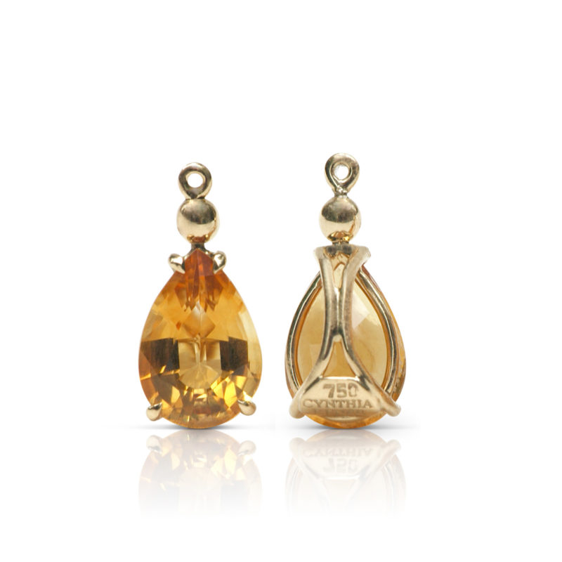 Gem drop pair in 18 karat yellow gold featuring pair of 4.69 carats pear-shape Citrine