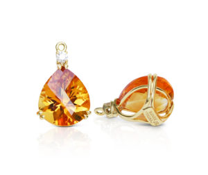 Gem drop pair in 18 karat yellow gold featuring pair of 14.65 carats pear-shape Citrine accented by pair of 0.20 carats round diamonds; tail on back for suspending drops.