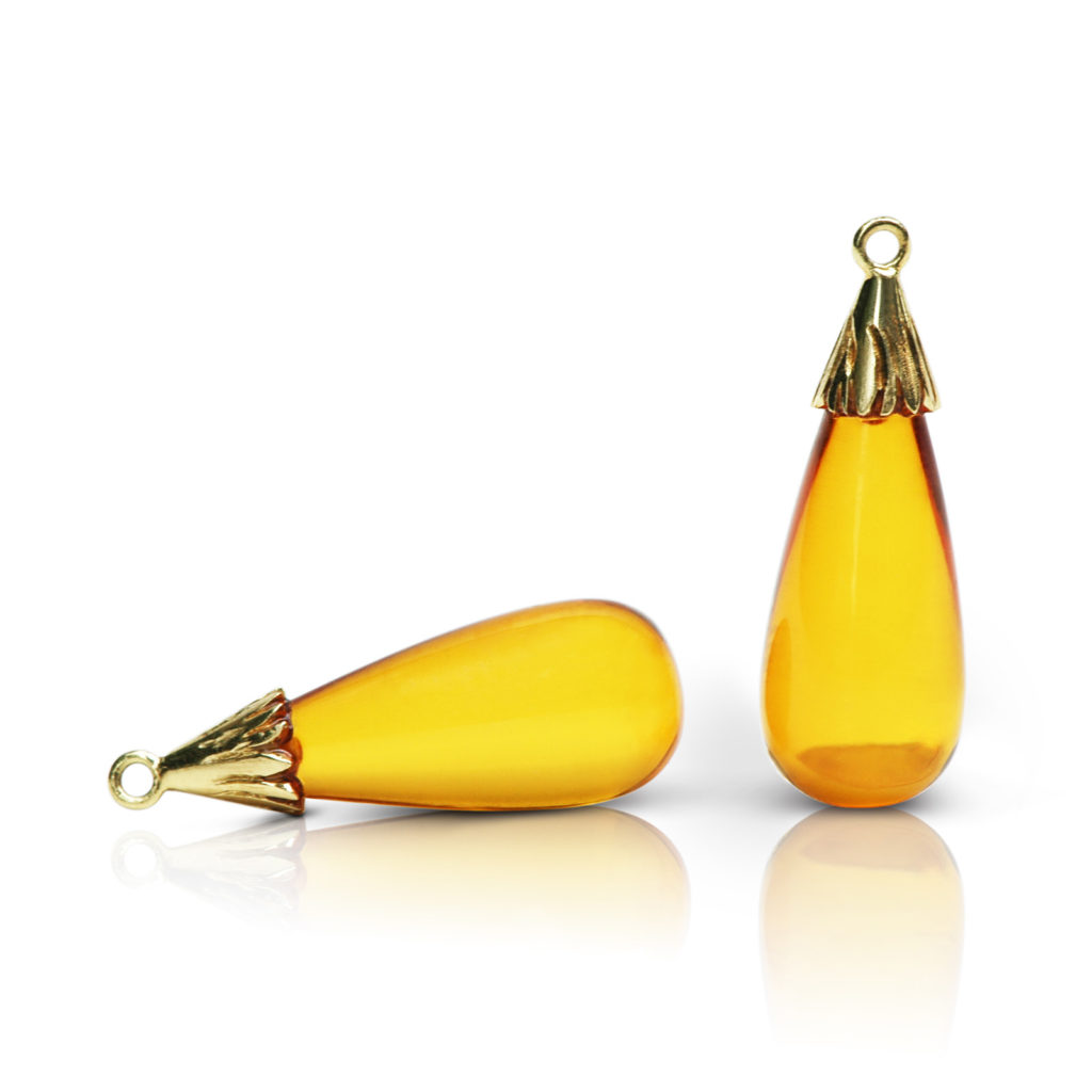 Gem drop pair in 18 karat yellow gold featuring pair of 14.96 carats golden amber smooth drops.