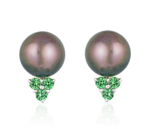 Tsavorite Garnet Jackets for 12-13 mm pearls in 18 karat white gold featuring six round tsavorite garnets weighing a total of approximately 0.66 carats.