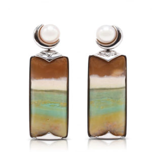 "Crescent" earrings in 18 karat white gold featuring 29.12 carats pair of natural Opalized Wood and a pair of 7-7.5 mm Freshwater Pearl; the opalized wood is found in the West Java Province of Indonesia.