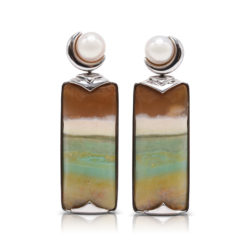 "Crescent" earrings in 18 karat white gold featuring 29.12 carats pair of natural Opalized Wood and a pair of 7-7.5 mm Freshwater Pearl; the opalized wood is found in the West Java Province of Indonesia.