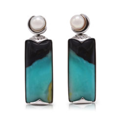 "Crescent" earrings in 18 karat white gold featuring 35.45 carat pair of natural Opalized Wood and a pair of 7-7.5 mm Freshwater Pearl; the opalized wood is found in the West Java Province of Indonesia.