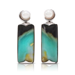 "Crescent" earrings in 18 karat white gold featuring 34.78 carat pair of natural Opalized Wood and a pair of 7-7.5 mm Freshwater Pearl; the opalized wood is found in the West Java Province of Indonesia.