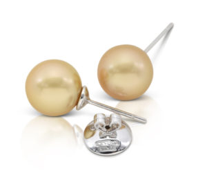 Pair of Golden South Sea Pearl earrings, size 11.5 mm, on 18 karat white gold removable "Progressive Pearl" posts with 12 mm parabolic friction backs.