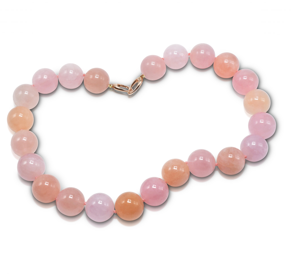 Bead Necklace consisting of 24 pieces of 18 mm smooth Morganite beads, in varegated colors) (Nigeria-N) strung on knotted thread with 14 karat rose gold double triggerless clasp; 17.5 inches long.