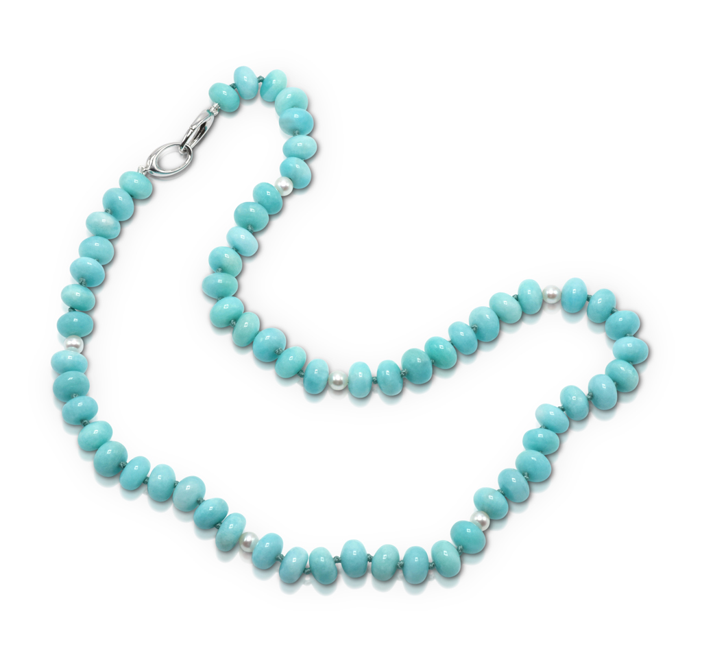 Bead Necklace consisting of 61 pieces of 10x7-mm smooth Amazonite (Peru-N) rondell shaped beads strung with six-5-mm freshwater pearls on knotted thread with 14-karat white gold double triggerless clasp; 21 inches long.
