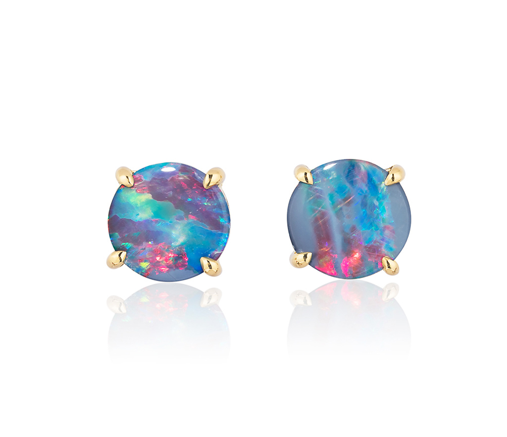 Elegant stud earring in a hand-crafted 18 karat yellow gold setting featuring pair of 1.63 carats Black Opal doublets; opals measure 7-mm round. 
