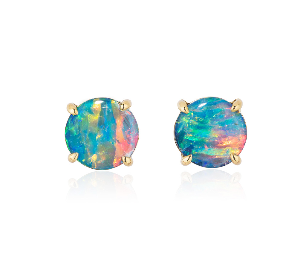 Elegant stud earring in a hand-crafted 18 karat yellow gold setting featuring pair of 1.63 carat Black Opal doublets; opals measure 7-mm round.