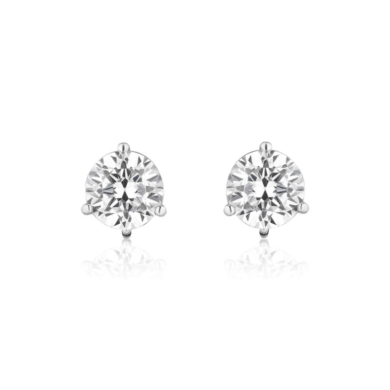 Three-prong 18 karat white gold stud featuring 7.0-mm cubic zirconia weighing a total of 4.45 carats with a heavy 8-mm friction back.