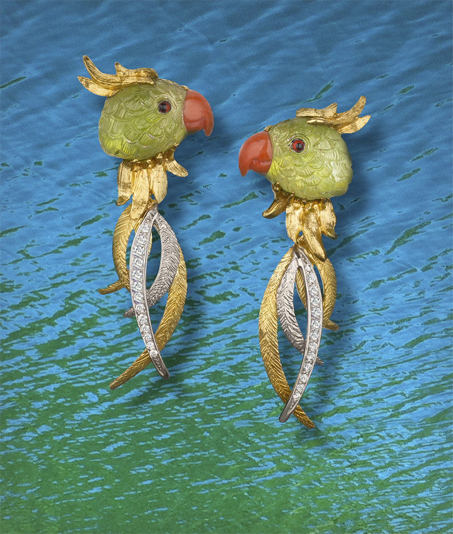 18-karat yellow gold and palladium earrings featuring handcarved Parrots from natural Peridot and Coral