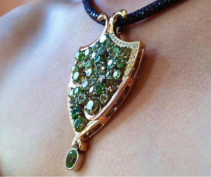 Impressionist” Pendant in 14 karat rose gold, 18-karat yellow gold and palladium featuring a collection of Demantoid Garnets