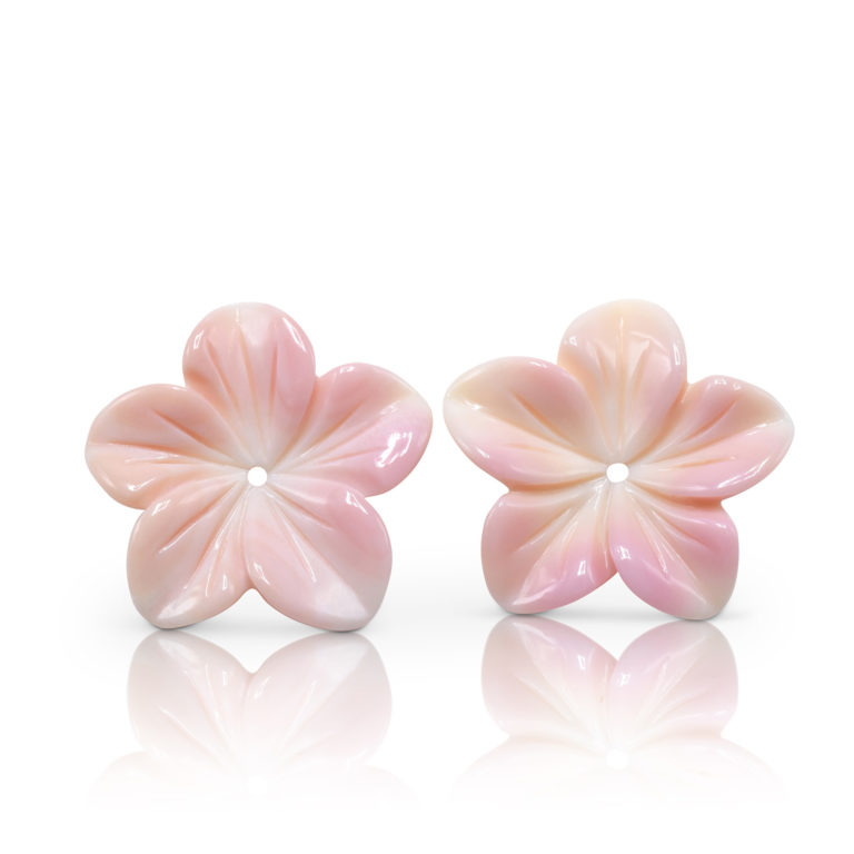 Floral earring jacket pair hand-carved in Peruvian Pink Opal, approximately 1-inch diameter.