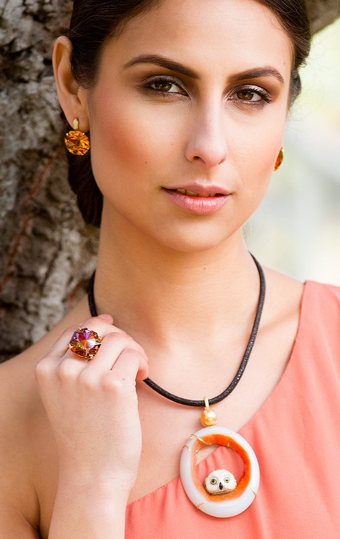 Owl pendant in 18 karat yellow gold featuring owlet handcarved of white petrified palm inside a natural druzy quartz slice, combined with 11.8 mm golden South Sea pearl; accented by one yellow diamond