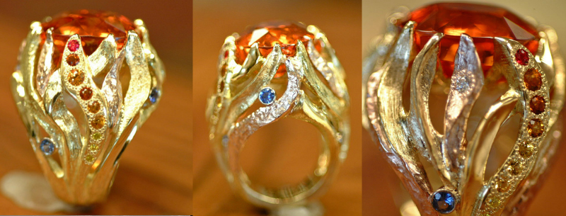 "Ring of Fire" - Cynthia Renée's custom design ring: "Ring of Fire" - Cynthia Renée's custom design ring: each side of the Ring of Fire has a different combination of gems, shapes and colors.