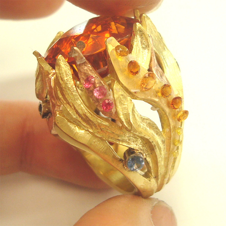 "Ring of Fire" - Cynthia Renée's custom design ring: experimenting with the layout of flame colors.