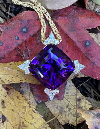 "Royal and Regal" ~ Cynthia Renee Bespoke Pendant featuring 79.90 carat Amethyst mined in Jackson's Crossroads, Georgia accented by four pear-shaped diamonds weighing 1.51 carats and eight 3 round diamonds weighing a total of 0.81 carats, set in 18 karat yellow gold.