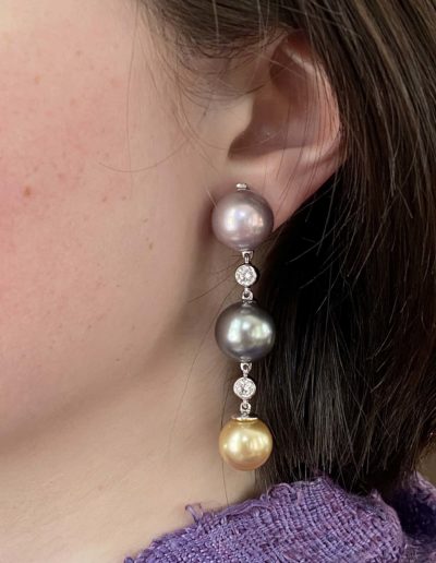 "Glamazon Pearl Drops" ~ Cynthia Renee Bespoke earring jacket for client's three pairs of 13 mm round pearls accented by 0.80 carats of diamonds. Pearls may be removed for wear on studs or drops or re-arranged in a different color sequence.