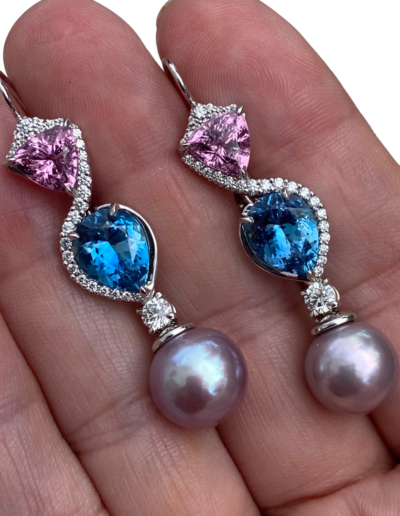 "Gemmy River" ~ Cynthia Renee Bespoke earrings featuring 3.62 carat Uber-fine Aquamarine and 3.01 carat Pink Spinel from Tajikistan accented by 45 round diamonds in 14 karat white gold.