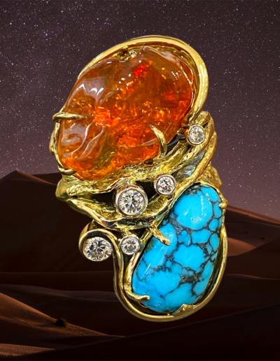 18 karat yellow gold and platinum featuring Fire Opal nodule from Queretaro, Mexico and Turquoise cabochon from Kingman, Arizona accented by 0.41 carats round diamonds.