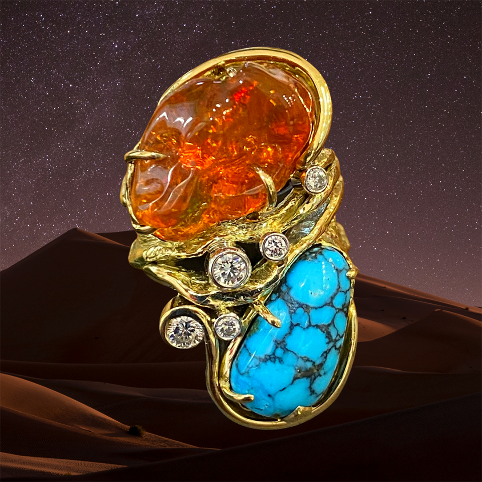 18 karat yellow gold and platinum with fire opal and turquoise cabochon and 0.41 carats round diamonds.