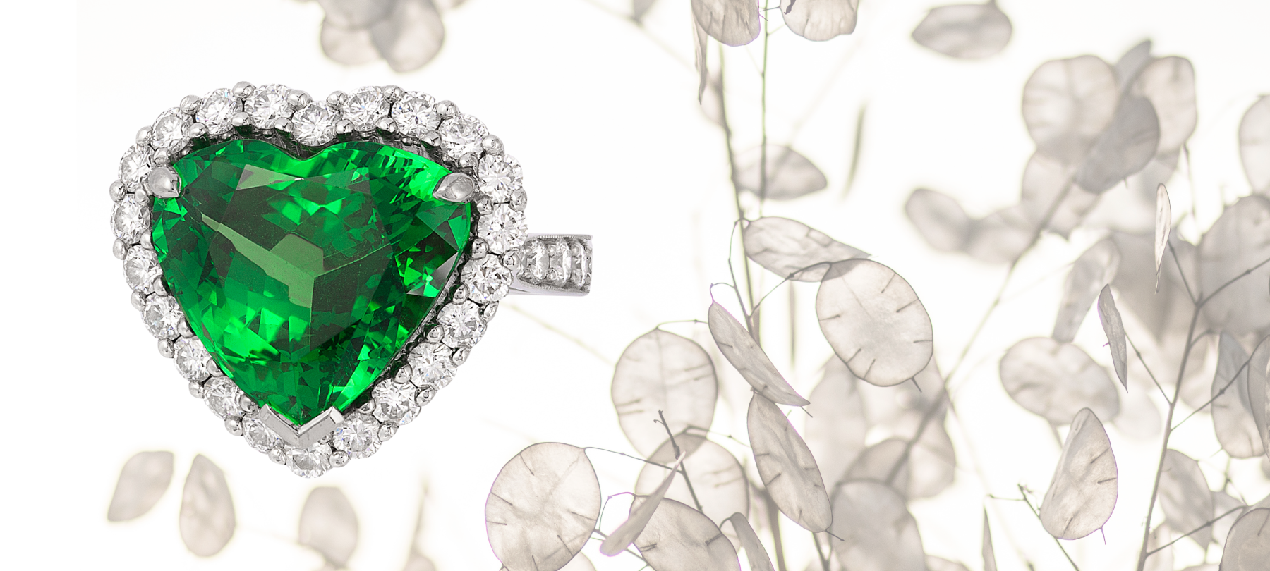 Platinum 10.63 carat tsavorite garnet ring (Komolo, Tanzania) accented with 1.62 carats of diamonds