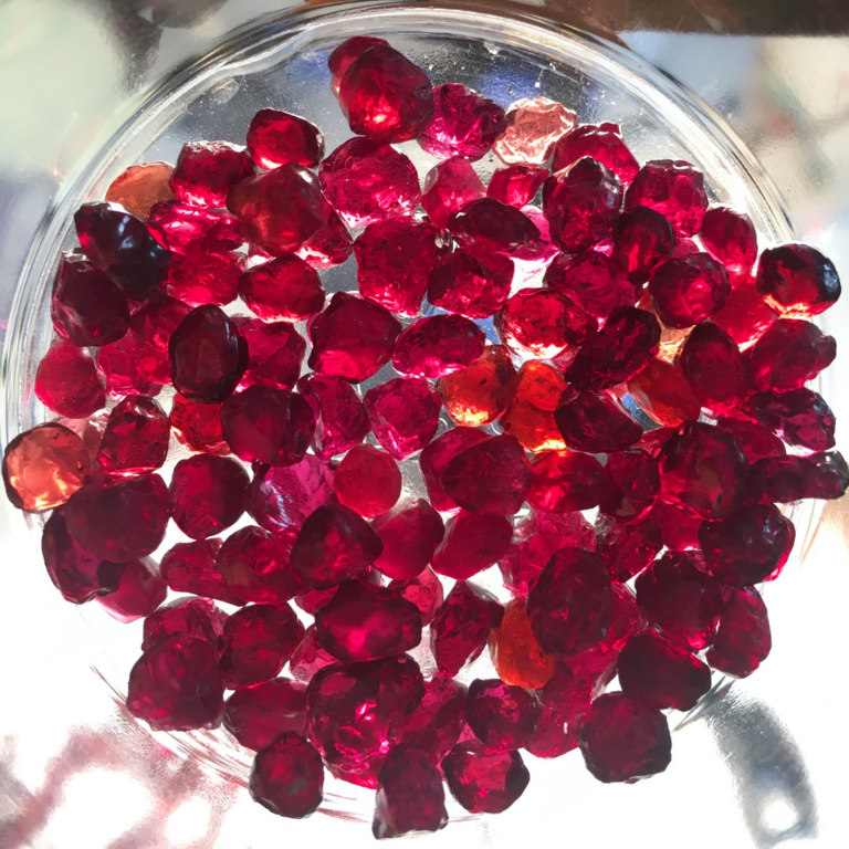 Tiny crystals of red "ant hill" pyrope garnet.