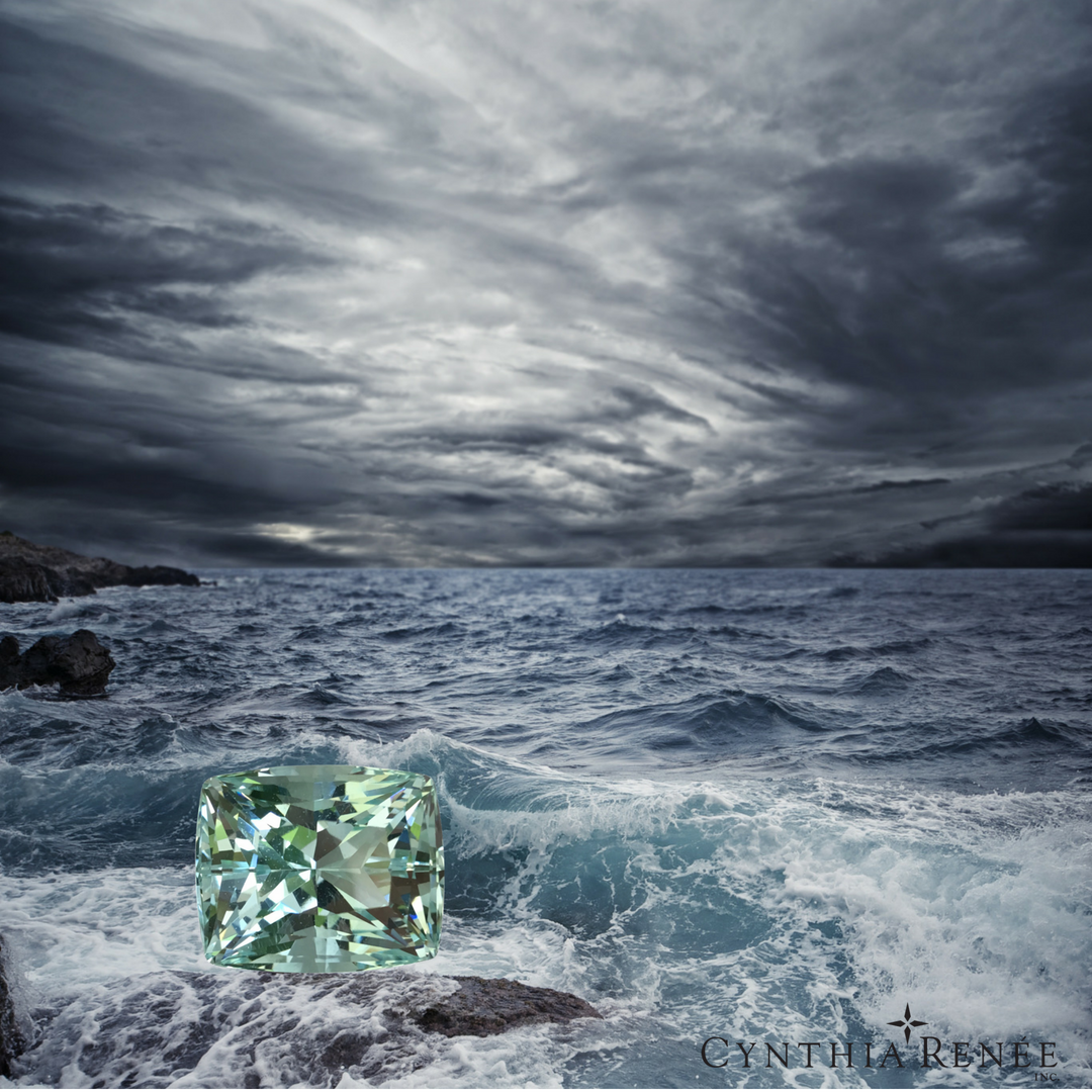 Light green aquamarine overlaid on an image of a stormy shoreline with dark clouds