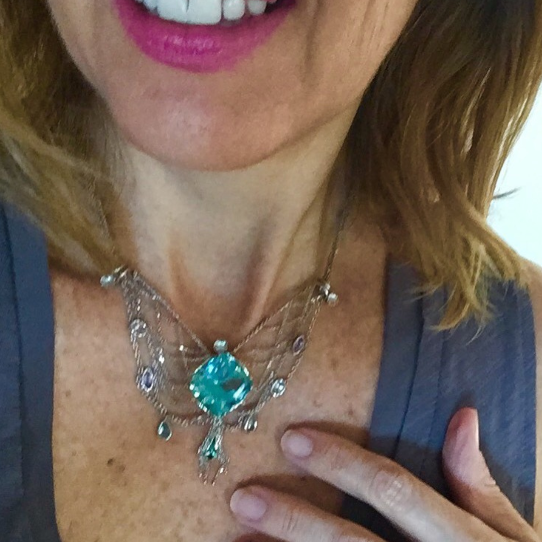 Photo 16: The bespoke “La Mer” aquamarine necklace radiates joy.