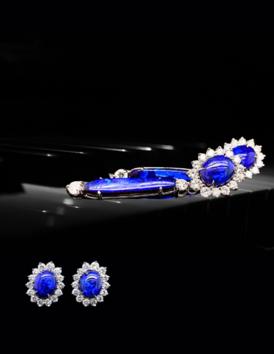 “Blue Night” ~ Cynthia Renee Bespoke Drop Earrings featuring two pairs of fine opals. Top portion of features 3.38 carats Black Opals (Coororan, Lightning Ridge, Australia) surrounded by 1.48 carats diamonds; removeable drop portion crafted from 5.60 carats Boulder Opal (Vergemont, Queensland, Australia) accented by 0.48 carats of round diamonds (G/VS-SI1). All set in 14 karat “super” white gold.