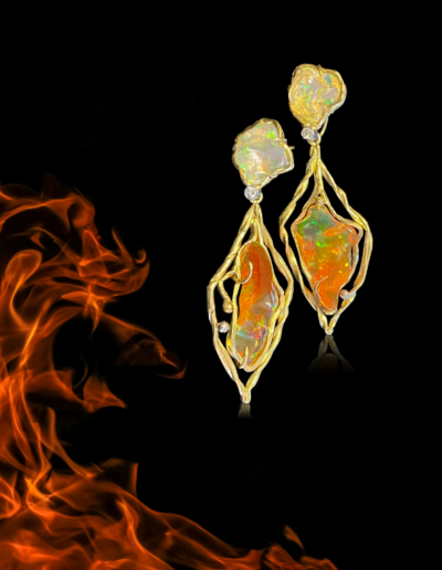 “Fire Dance” ~ Cynthia Renee Bespoke earrings in 18 karat yellow gold featuring 16.11 carats of Mexican Fire Opals accented by 0.24 carats of diamonds. 