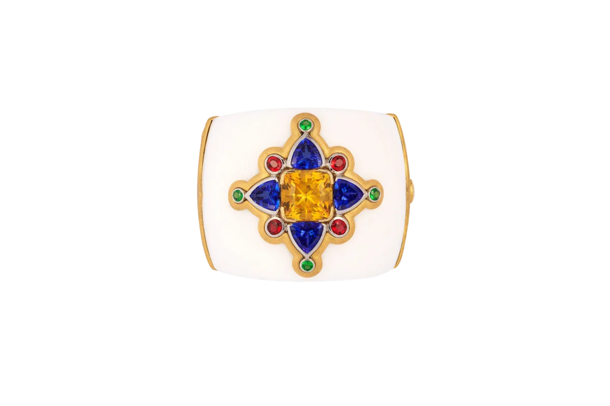 white ring with gemstones